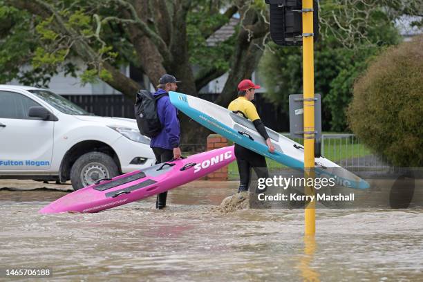 Surf lifesavers get ready to check houses in flooded streets on February 14, 2023 in Napier, New Zealand. New Zealand has declared a national state...