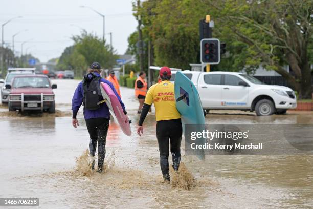 Surf lifesavers get ready to check houses in flooded streets on February 14, 2023 in Napier, New Zealand. New Zealand has declared a national state...