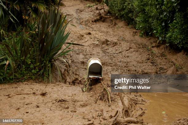 Large landslide flows out onto Domain Crescent in Muriwai following Cyclone Gabrielle on February 14, 2023 in Auckland, New Zealand. New Zealand has...