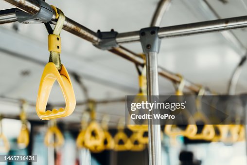 Hand Rails In A Bus Yellow Handrails Inside The Bus High-Res Stock Photo - Getty Images