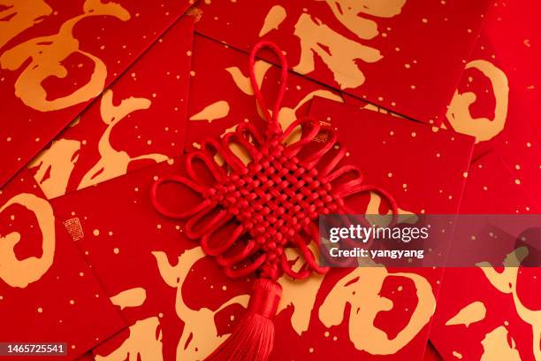 traditional chinese new year red envelopes and chinese knots - chinese new year icon stock pictures, royalty-free photos & images