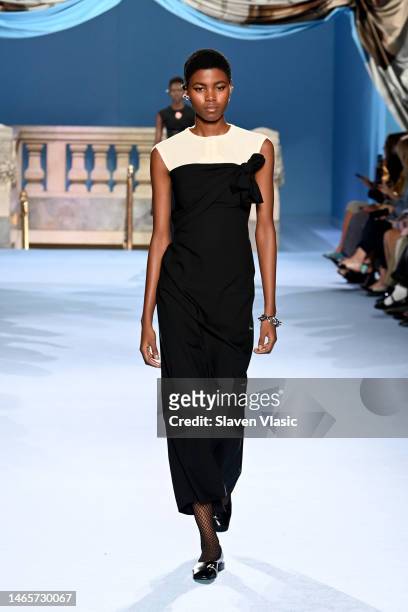 Model walks the runway wearing Tory Burch during Fall/Winter 2023 New York Fashion Week on February 13, 2023 in New York City.