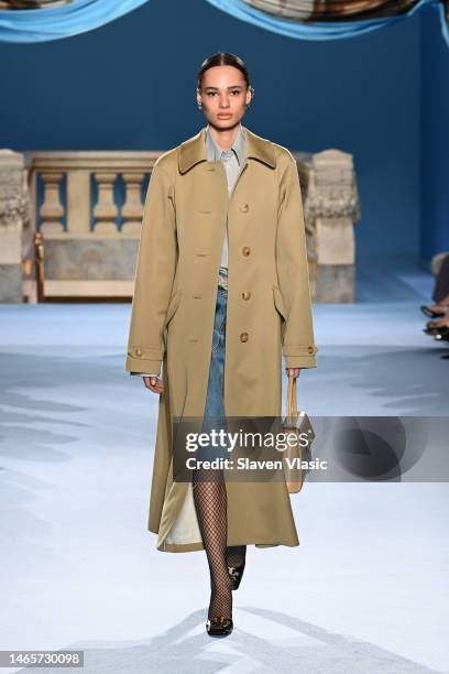 Model walks the runway wearing Tory Burch during Fall/Winter 2023 New York Fashion Week on February 13, 2023 in New York City.