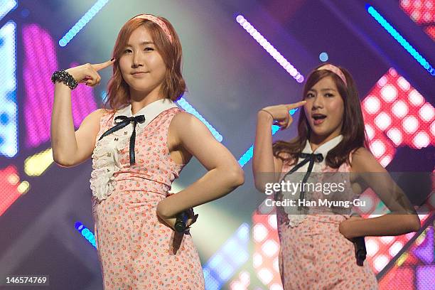 South Korean idol girl group A Pink performs on stage the MBC Music 'Show Champion' at AX Korea on June 19, 2012 in Seoul, South Korea.