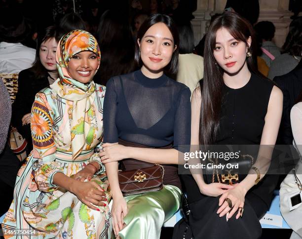 Halima Aden, Melinda Wang, and Cecilia Boey attend the Tory Burch Fall/Winter 2023 New York Fashion Week show on February 13, 2023 in New York City.