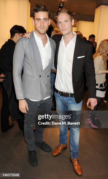 Oliver Jackson-Cohen and Jack Fox attend as EA7 Emporio Armani Summer Garden Live presents Summer of Sport at Emporio Armani on June 19, 2012 in...