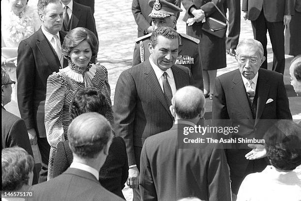 Japanese Emperor Hirohito , Egyptian President Hosni Mubarak and his wife Suzanne attend the welcome ceremony at the state guest house on April 6,...