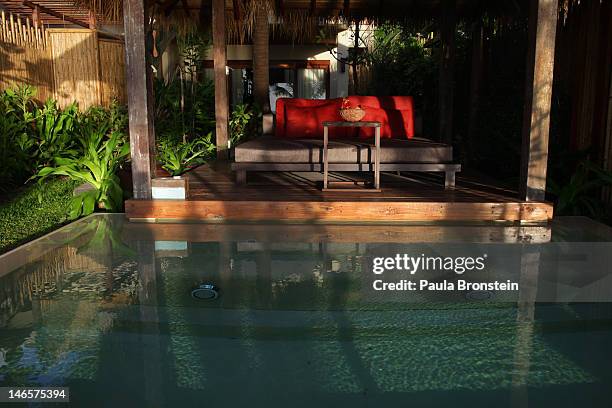 Sun shines on the pool villa early morning at the Anantara Rasananda resort June 18, 2012 on the island of Koh Phangan off the coast of Koh Samui ....