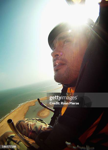 Mohd Hurairah Alinur of Malaysia flies his Paraglider during the Powered Paragliding Open Individual Economy Final on Day 4 of the 3rd Asian Beach...