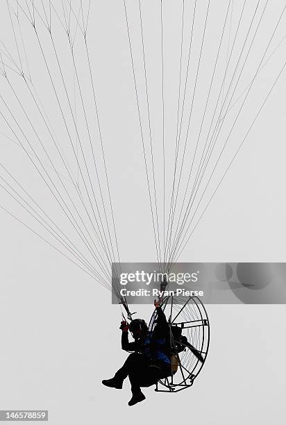 Competitor flies during the Powered Paragliding Open Individual Economy Final on Day 4 of the 3rd Asian Beach Games Haiyang 2012 on June 20, 2012 in...