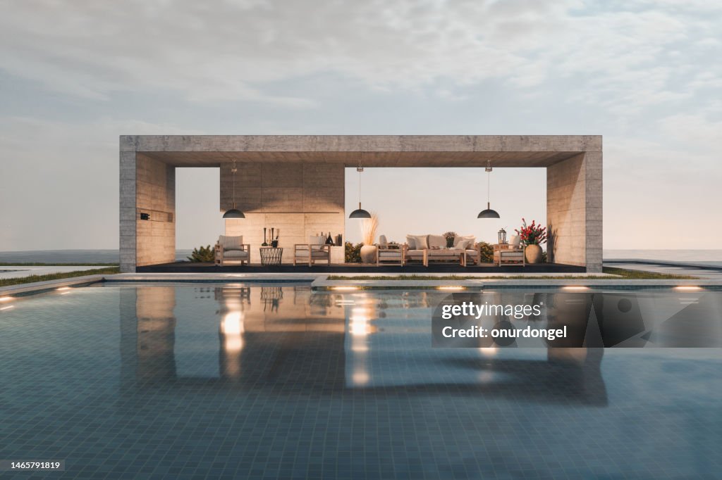 Lounge-Interieur mit Sofa und Sesseln am Pool