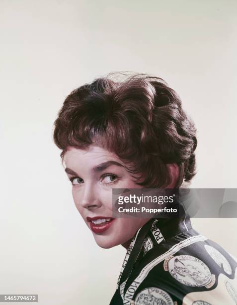 Posed studio portrait of English actress Dawn Addams in London, 23rd March 1957.