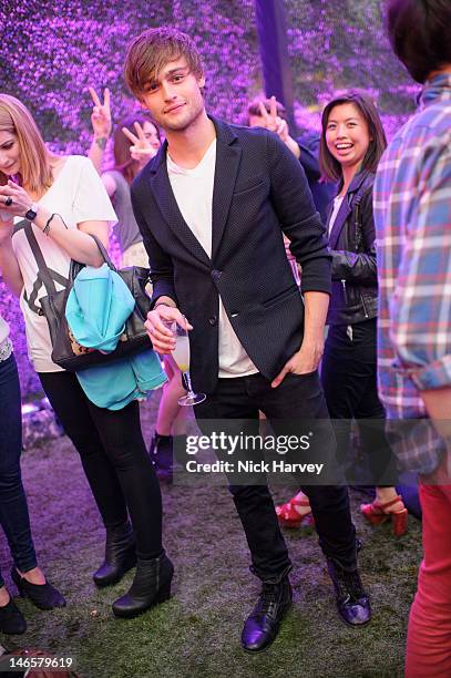 Douglas Booth attends at Emporio Armani Summer Garden Live at Emporio Armani on June 19, 2012 in London, England.