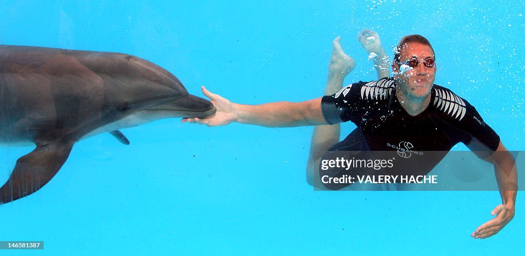 French swimmer Alain Bernard swims with 