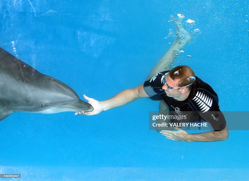 French swimmer Alain Bernard swims with 