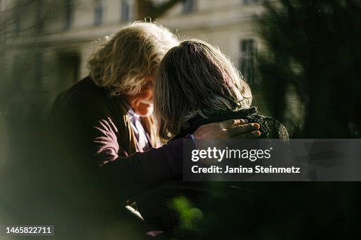 Rear view of senior couple with arm around each other Rear view of senior couple with arm around each other