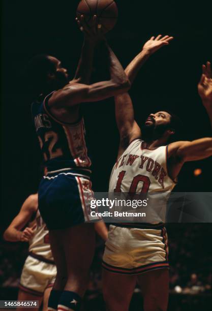 The New York Knicks' Walt Frazier tries to block Larry Jones of the Philadelphia 76ers during a game in New York on January 26th, 1974.