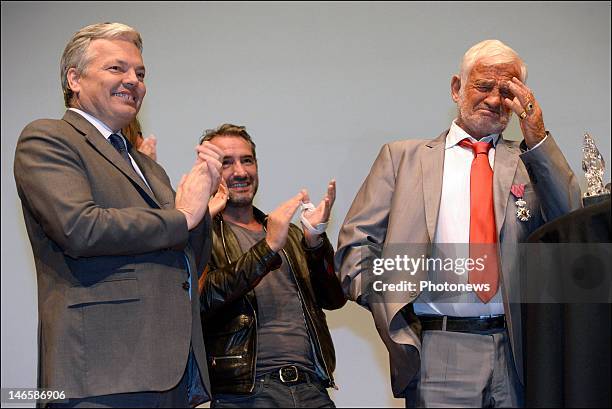 Legendary French actor Jean-Paul Belmondo with Belgian Minister Didier Reynders while receiving the Order of King Leopold for his Life Achievement on...