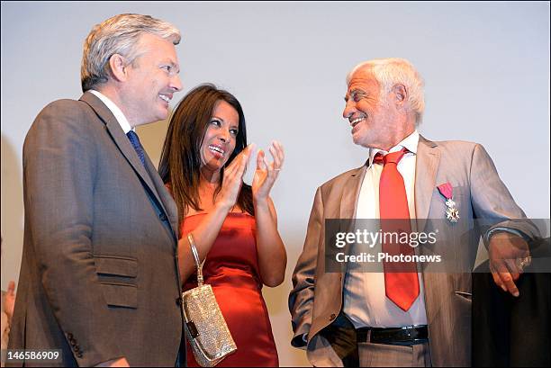 Legendary French actor Jean-Paul Belmondo with Belgian Minister Didier Reynders and his girlfriend Barbara Gandolfi while receiving the Order of King...