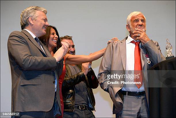 Legendary French actor Jean-Paul Belmondo with Belgian Minister Didier Reynders and his girlfriend Barbara Gandolfi while receiving the Order of King...