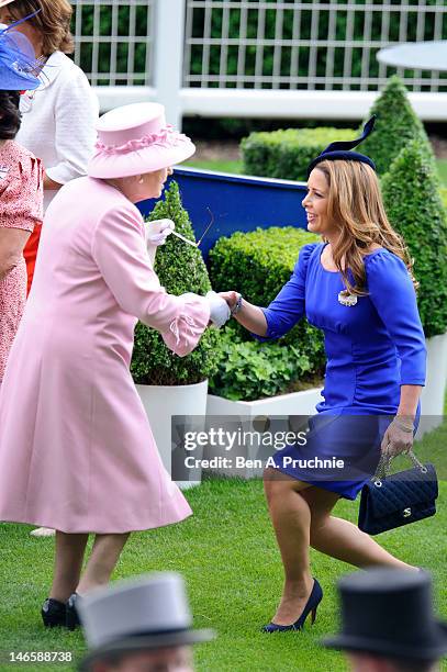 Queen Elizabeth II and Princess Haya bint Al Hussein attend day two of Royal Ascot at Ascot Racecourse on June 20, 2012 in Ascot, England.