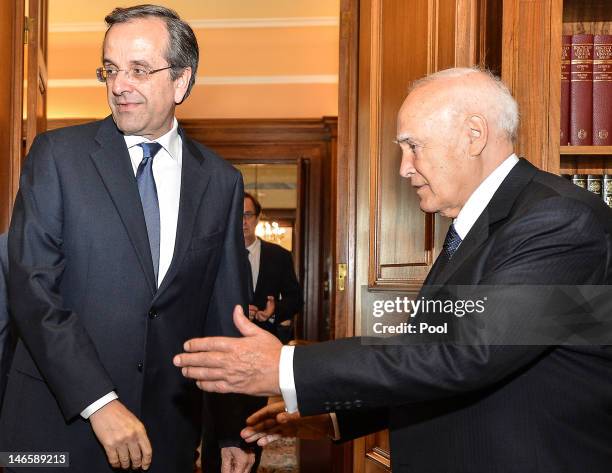 The head of Greece's conservative New Democracy party, Antonis Samaras meets with Greek President Karolos Papoulias at the presidential palace on...