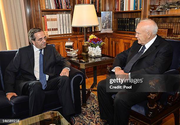 The head of Greece's conservative New Democracy party, Antonis Samaras meets with Greek President Karolos Papoulias at the presidential palace on...