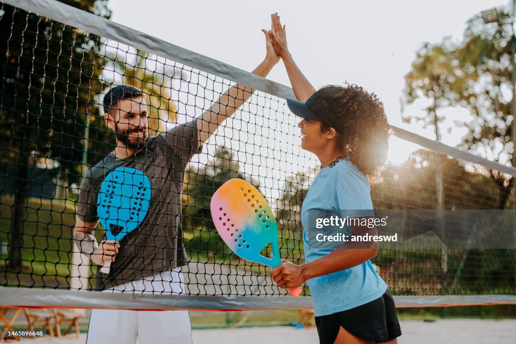 Greeting the opponent at the end of the beach tennis game