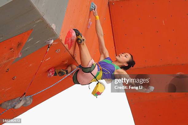 Kim Ja In of South Korea completes in the Sport Climbing Women's Lead Final on Day 4 of the 3rd Asian Beach Games Haiyang 2012 on June 20, 2012 in...
