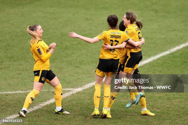 Jade Cross of Wolverhampton Wanderers celebrates with teammates after scoring their team's second goal during the FAWNL Northern Premier Division...