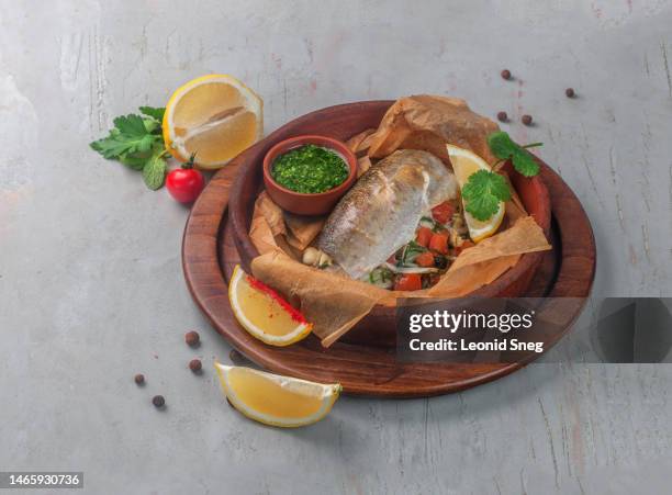 roasted trout stuffed with vegetables on gray background - regnbågsforell bildbanksfoton och bilder