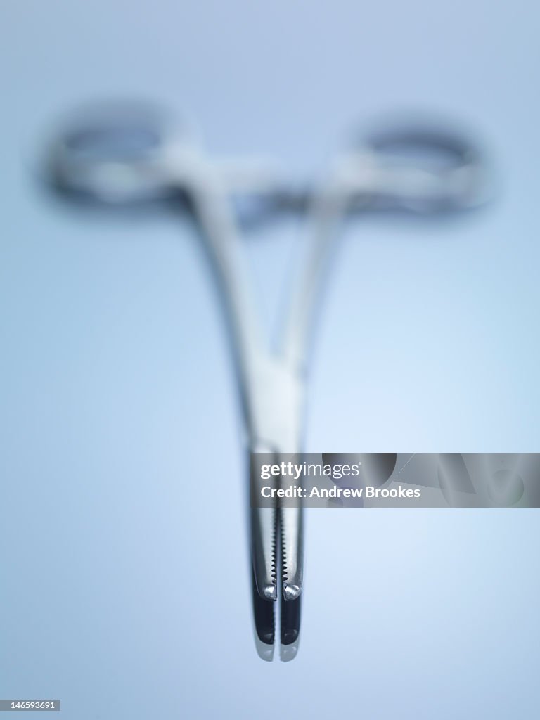 Close up of pair of forceps