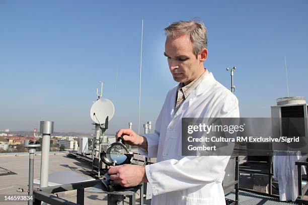scientist working in field - meteorology foto e immagini stock
