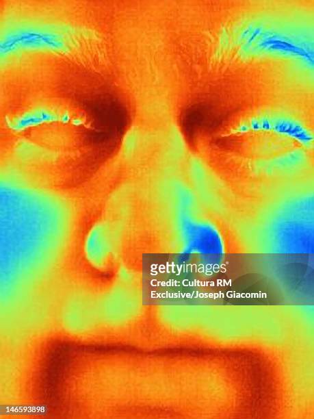 thermal image of mans face with no irises - thermal image fotografías e imágenes de stock