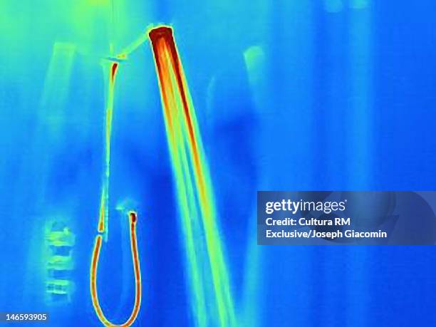 thermal image of shower running hot water - thermal imaging stock pictures, royalty-free photos & images