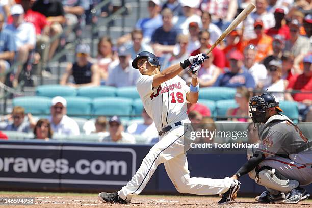 Andrelton Simmons of the Atlanta Braves pops up during the interleague game against the Balitmore Orioles at Turner Field on June 17, 2012 in...