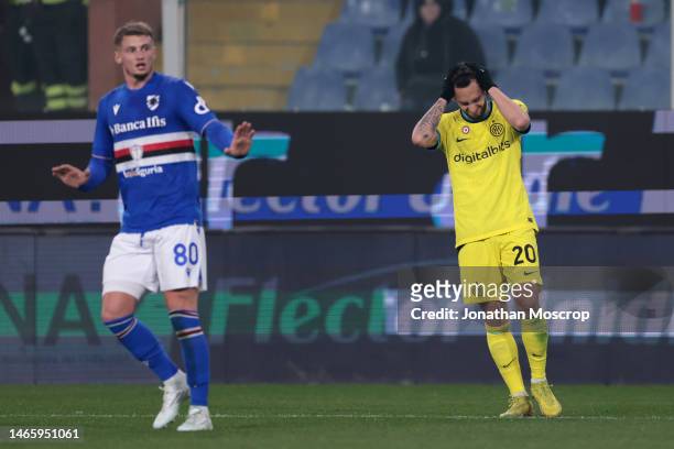 Mickael Cuisance of UC Sampdoria and Hakan Calhanoglu of FC Internazionale react during the Serie A match between UC Sampdoria and FC Internazionale...