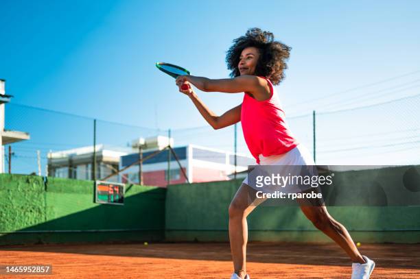 female tennis player playing - atividade stock pictures, royalty-free photos & images