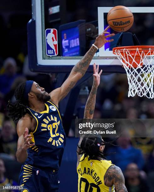 Isaiah Jackson of the Indiana Pacers blocks a shot attempt by Jordan Clarkson of the Utah Jazz in the first quarter at Gainbridge Fieldhouse on...