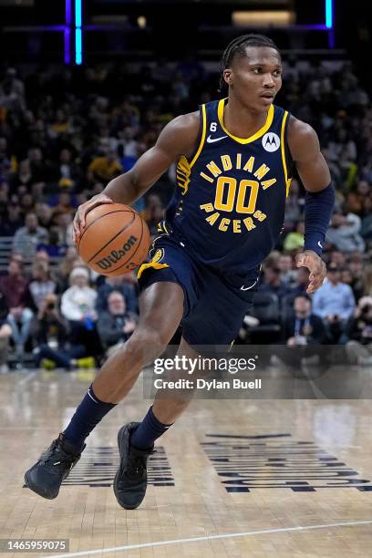 Bennedict Mathurin of the Indiana Pacers dribbles the ball in the second quarter against the Utah Jazz at Gainbridge Fieldhouse on February 13, 2023...