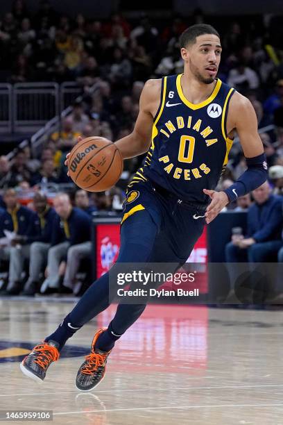 Tyrese Haliburton of the Indiana Pacers dribbles the ball in the second quarter against the Utah Jazz at Gainbridge Fieldhouse on February 13, 2023...