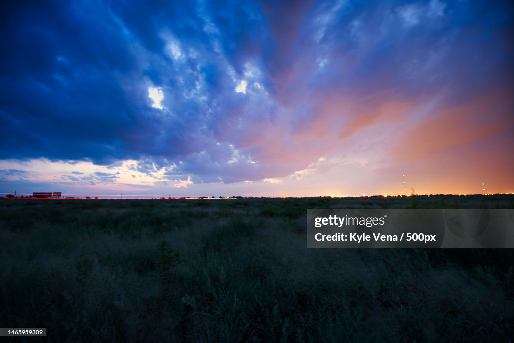 Scenic view of field against sky during sunset,United States,USA