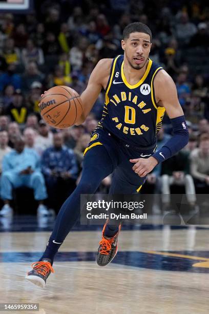 Tyrese Haliburton of the Indiana Pacers dribbles the ball in the first quarter against the Utah Jazz at Gainbridge Fieldhouse on February 13, 2023 in...