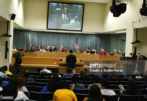 Actor Arnold Schwarzenegger speaks to members of the Los Angeles Unified School District board October 8, 2002 in Los Angeles, California....