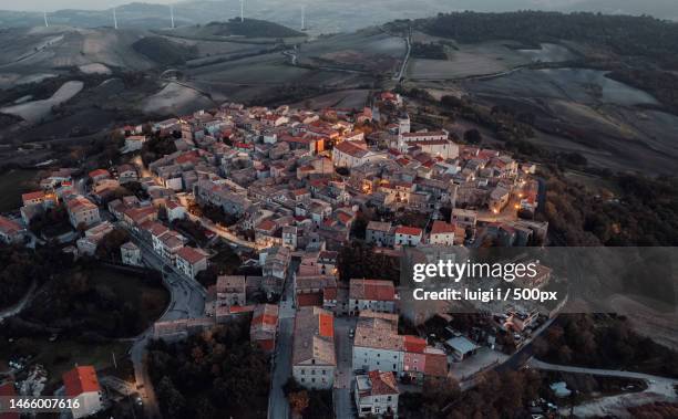 high angle view of buildings in city,montorio nei frentani,province of campobasso,italy - church tower restoration appeal stock pictures, royalty-free photos & images