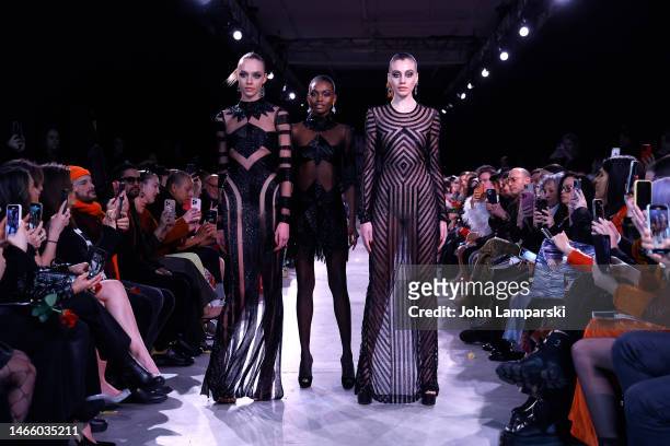 Models walk the runway wearing Naeem Khan during New York Fashion Week 2023 on February 14, 2023 in New York City.