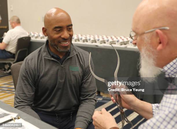 Ronde Barber prepares to be measured for his bust by sculptor Blair Buswell during the Bronze Bust Measurement at the Pro Football Hall of Fame...