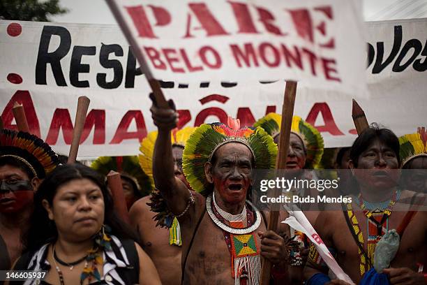 Brazilian indigenous, during an indigenous march against the hydroelectric of Belo Monte in the surroundings of RioCentro convention center, where...