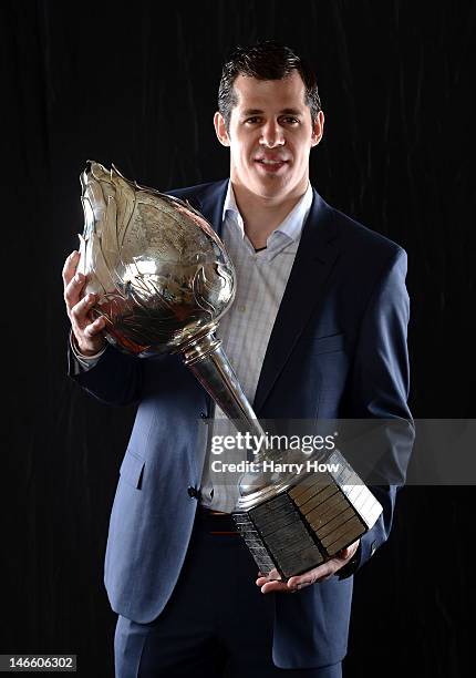 Evgeni Malkin of the Pittsburgh Penguins poses after winning the Hart Trophy during the 2012 NHL Awards at the Encore Theater at the Wynn Las Vegas...