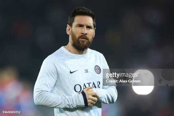 Lionel Messi of Paris Saint-Germain warms up prior to the UEFA Champions League round of 16 leg one match between Paris Saint-Germain and FC Bayern...